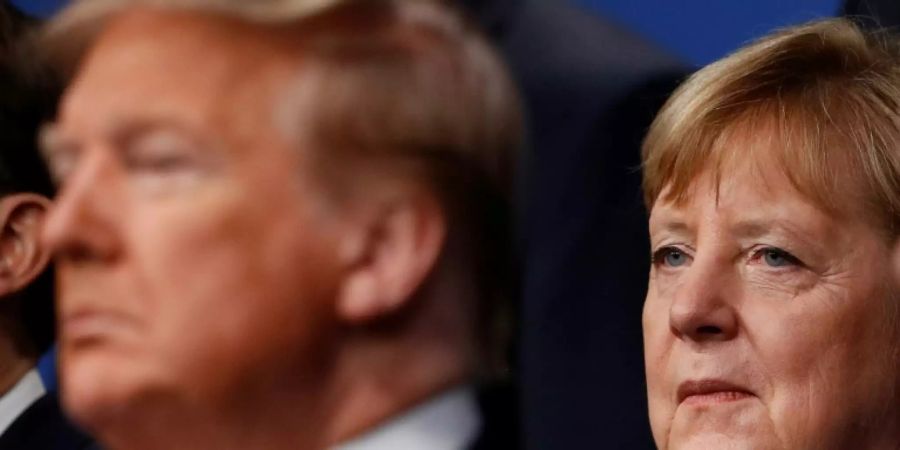 Trump und Merkel im Dezember