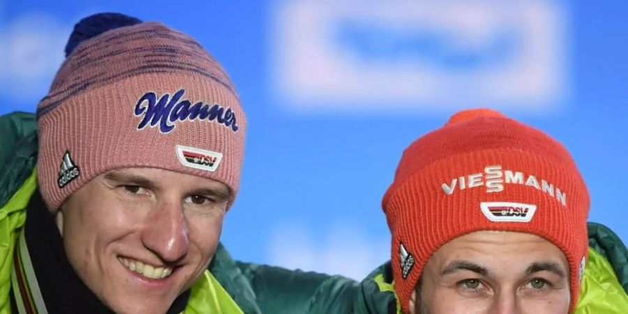 Der erste Weltcup der Skisprung-Saison findet im russischen Nischni Tagil statt. Mit dabei: Markus Eisenbichler (r) und Karl Geiger. Foto: Hendrik Schmidt/dpa/Archivbild