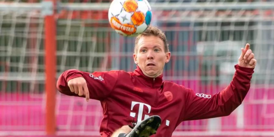 Trainer Julian Nagelsmann wird vom ehemaligen Bayern-Boss gelobt. Foto: Peter Kneffel/dpa