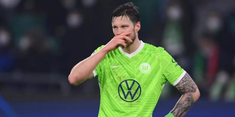Wolfsburgs Wout Weghorst ist enttäuscht. Foto: Swen Pförtner/dpa
