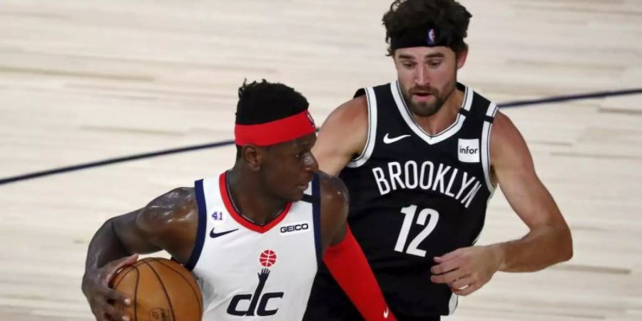 Isaac Bonga (l) verlor erneut mit den Washington Wizards. Foto: Kim Klement/Pool USA Today Sports/AP/dpa