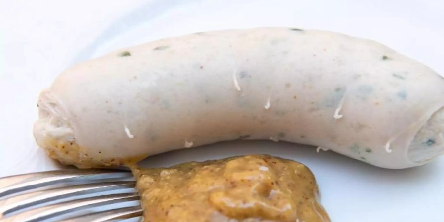 Die Fleischwerke E. Zimmermann rufen ihr Produkt «BIO Münchner Weisswürste» in der Dose zurück. Foto: Peter Kneffel/dpa/Illustration