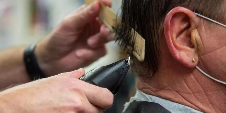 In Deutschland gibt es mehr als 80.000 Friseursalons. Foto: Harald Tittel/dpa