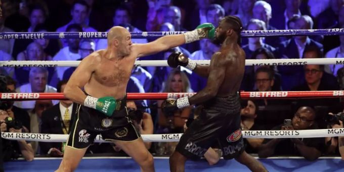 Der WM-Kampf zwischen Tyson Fury (l) und Deontay Wilder soll nun im Herbst stattfinden. Foto: Bradley Collyer/PA Wire/dpa