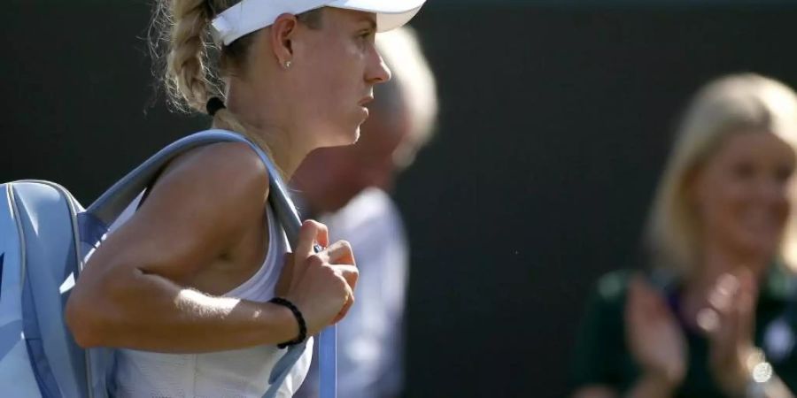 Nix wie weg: Angelique Kerber verlässt nach dem Aus in Wimbledon rasch den Platz. Foto: Steven Paston/PA Wire