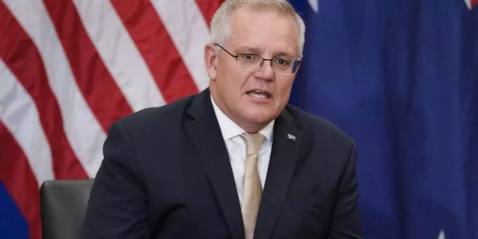Australiens Premierminister Scott Morrison ist noch unschlüssig, ob er zum UN-Klimagipfel fährt. Foto: Evan Vucci/AP/dpa/Archivbild Australiens Premierminister Scott Morrison ist noch unschlüssig, ob er zum UN-Klimagipfel fährt. Foto: Evan Vucci/AP/dpa/Archivbild