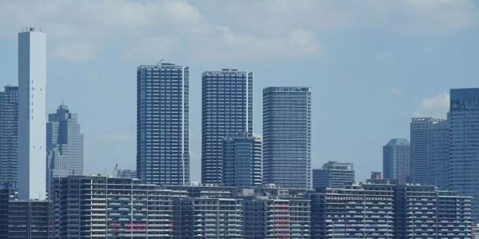 Ein Blick auf die Gebäude vom olympischen Dorf, einer Wohnsiedlung für die Athleten der Sommerspiele in Tokio. Foto: Mike Egerton/PA Wire/dpa Ein Blick auf die Gebäude vom olympischen Dorf, einer Wohnsiedlung für die Athleten der Sommerspiele in Tokio. Foto: Mike Egerton/PA Wire/dpa
