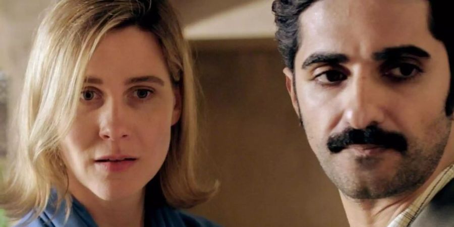 Die in der DDR lebende Chemikerin Beate (Katrin Röver) und ihr aus dem Iran stammender Mann Omid (Reza Brojerdi). Foto: --/WDR/Little Dream Entertainmen/dpa