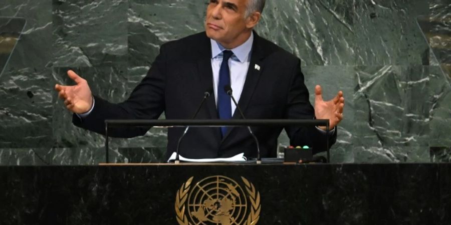 'The only way to prevent Iran from getting a nuclear weapon, is to put a credible military threat on the table,' Israel's Prime Minister Yair Lapid said in a speech at the UN General Assembly