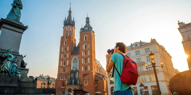 Tourist mit Kamera in Krakau