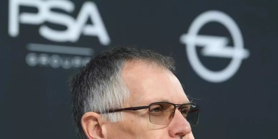 PSA-Konzernchef Carlos Tavares während einer Pressekonferenz in Rüsselsheim. Foto: Arne Dedert/dpa/Archiv