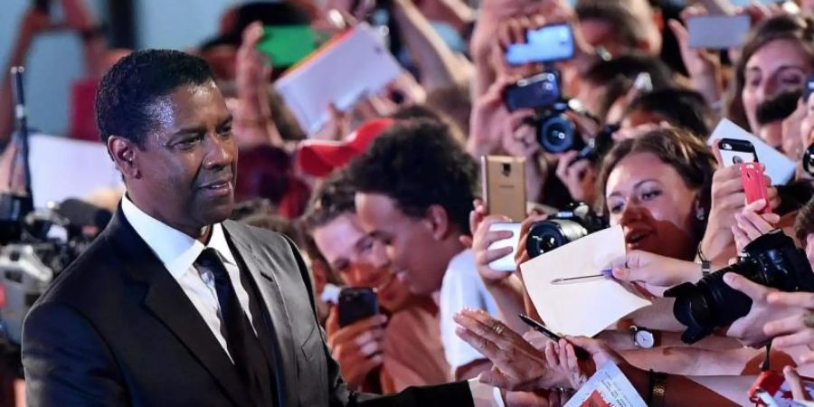 Denzel Washington feiert seinen 65. Geburtstag. Foto: Ettore Ferrari/epa/dpa