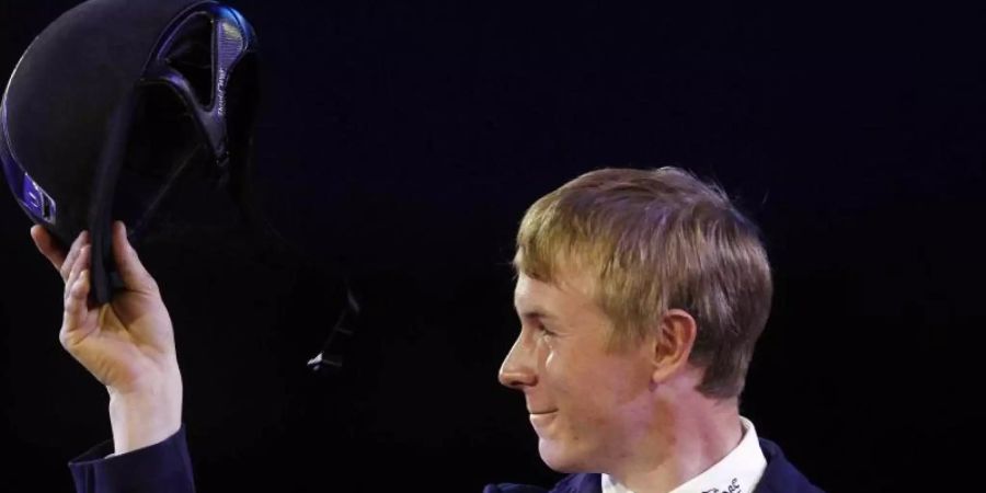 David Will hat überraschend den Grossen Preis in Hickstead gewonnen. Foto: Bas Czerwinski/epa