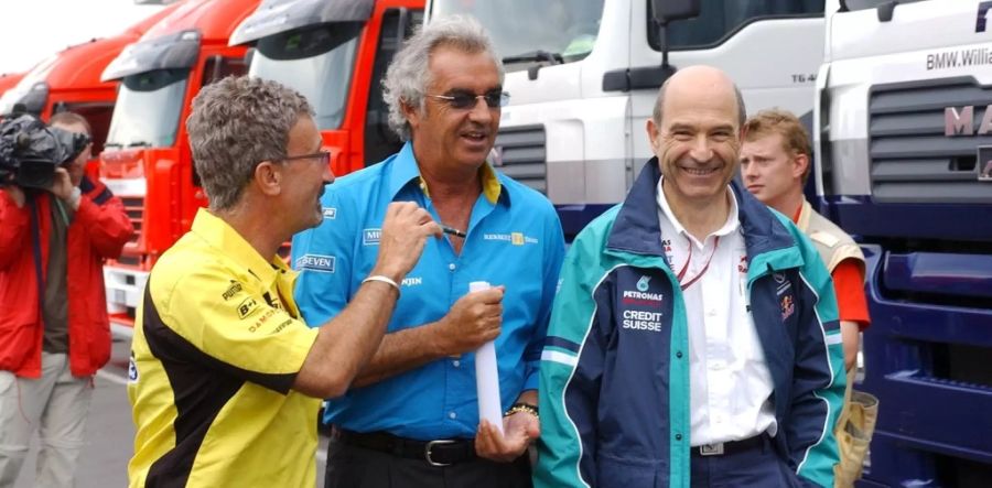 Eddie Jordan (l.) mit Flavio Briatore (m.) und Peter Sauber im Juni 2003.