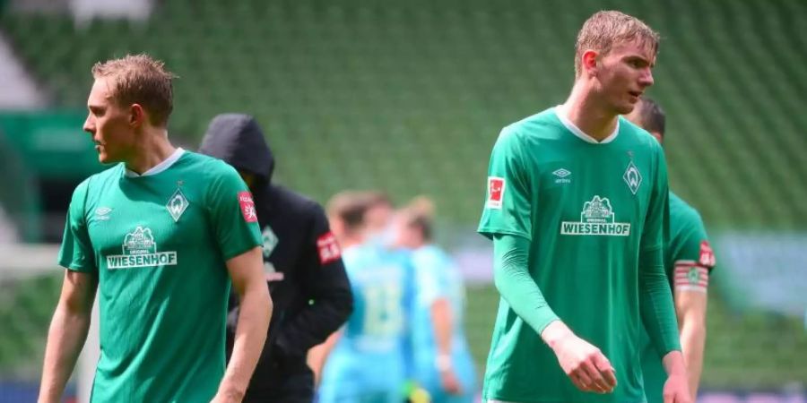 Werder Bremen ist nach der Niederlage gegen Wolfsburg jetzt schon sechs Punkte von einem direkten Nichtabstiegsplatz entfernt. Foto: Patrik Stollarz/AFP/Pool/dpa