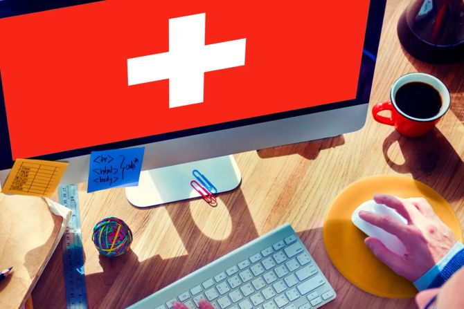 Bildschirm Schweizerflagge Schreibtisch Computer