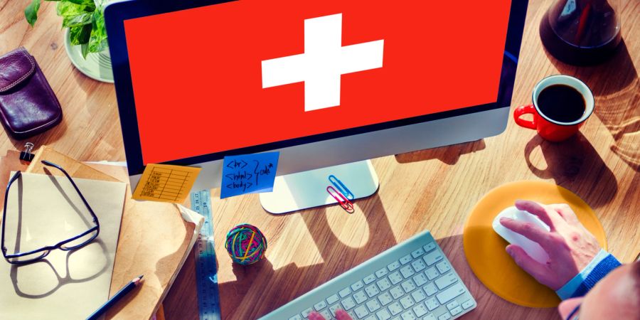 Bildschirm Schweizerflagge Schreibtisch Computer