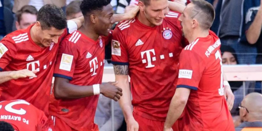 Der FC Bayern München legte im Meisterschaftsrennen dank des Treffers von Niklas Süle (2.v.r.) vor. Foto: Matthias Balk