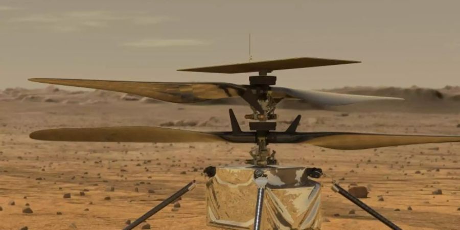 Diese von der NASA zur Verfügung gestellte Illustration zeigt den Mini-Hubschrauber «Ingenuity» auf der Marsoberfläche. Foto: Jpl-Caltech/NASA/ZUMA Wire/dpa