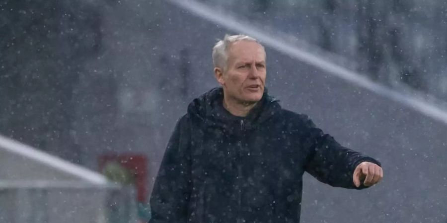 Sorgt sich um die Folgen der Corona-Pandemie: Freiburgs Trainer Christian Streich. Foto: Sven Hoppe/dpa