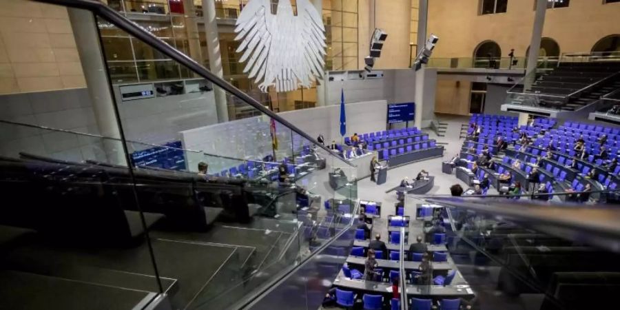 Der Bundestag hat ein Gesetz verabschiedet, das es den Sicherheitsbehörden schwerer macht, zur Strafverfolgung und Terrorabwehr sogenannte Bestandsdaten abzurufen. Foto: Christoph Soeder/dpa