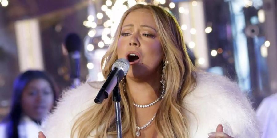 Mariah Carey bei der Silvesterfeier 2018 auf dem Times Square. Foto: Brent N. Clarke/Invision/AP/dpa