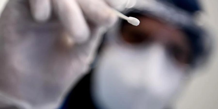 Die Gesundheitsämter meldeten dem RKI binnen eines Tages 76.465 Neuinfektionen. Foto: Britta Pedersen/dpa-Zentralbild/dpa