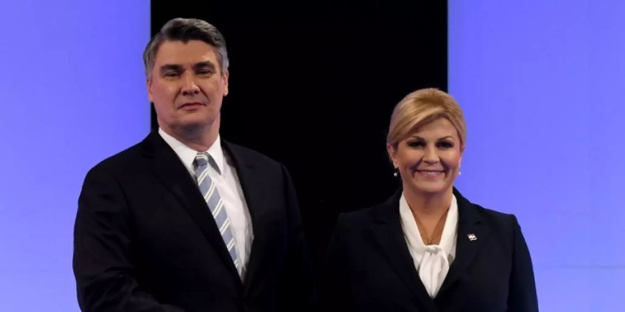 Präsidentin Grabar-Kitarovic und ihr Herausforderer Milanovic