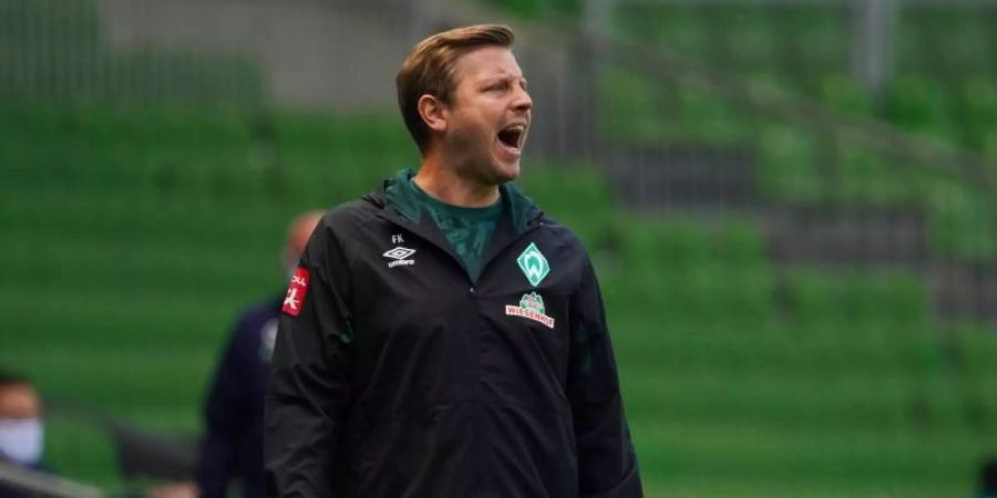 Geht mit Bremen als Favorit in die Relegation gegen den FC Heidenheim: Werder-Coach Florian Kohfeldt. Foto: Patrik Stollarz/AFP/Pool/dpa