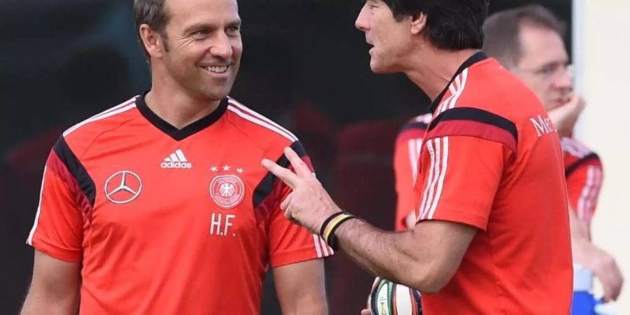 Hansi Flick (l) machte sich einen Namen als Co-Trainer von Bundestrainer Joachim Löw. Foto: Marcus Brandt