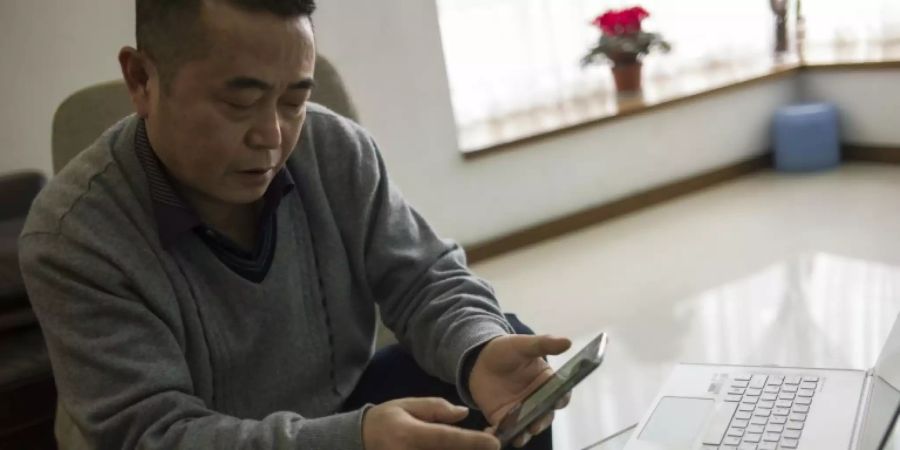 Huang berichtete auf seiner Webseite über Menschenrechte