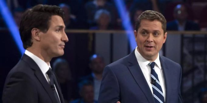 Premierminister Justin Trudeau (l) zusammen mit dem Vorsitzenden der Konservativen, Andrew Scheer. Foto: Sean Kilpatrick/The Canadian Press/AP/dpa kanada