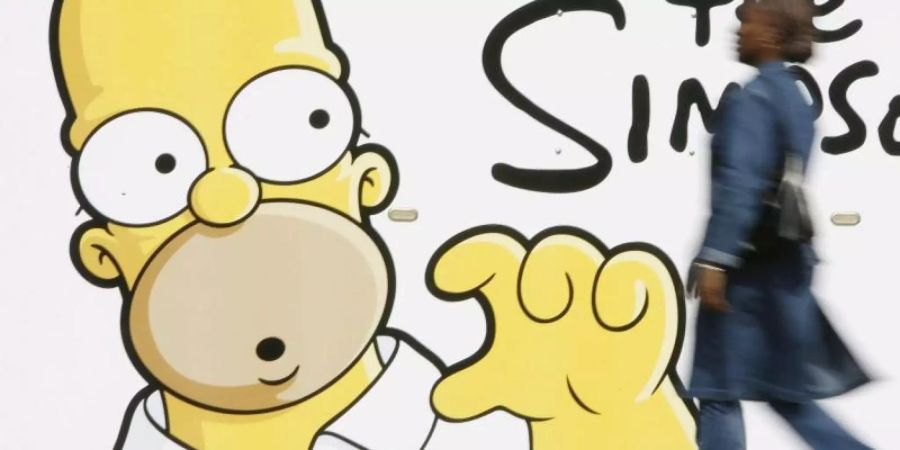 Werbeplakat für den Kinofilm «The Simpsons». Die Serie wird um weitere Staffeln verlängert. Foto: Benoit Doppagne/epa belga