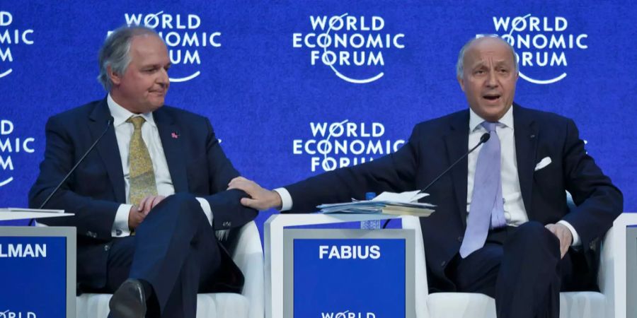 Paul Polamn mit Laurent Fabius am WEF 2016.