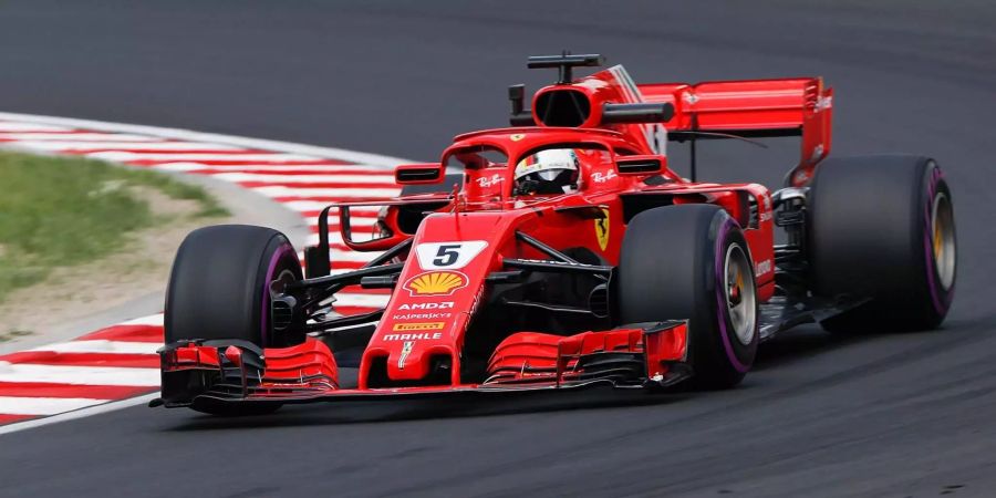 Sebastian Vettel aus Deutschland vom Team Scuderia Ferrari fährt auf der Rennstrecke beim Freitagstraining zum Grossen Preis von Ungarn.