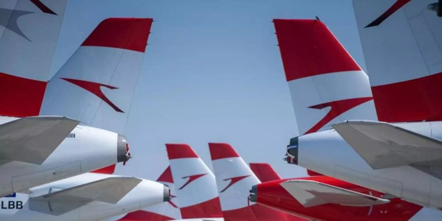 Flugzeuge der Austrian Airlines stehen am Flughafen Wien-Schwechat. Mit einem 600-Millionen-Rettungspaket soll die Lufthansa-Tochter die Corona-Krise überstehen. Foto: AUSTRIAN AIRLINES/APA/dpa