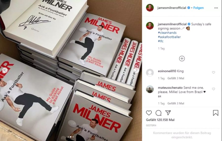 Liverpools James Milner schreibt Autogramme.