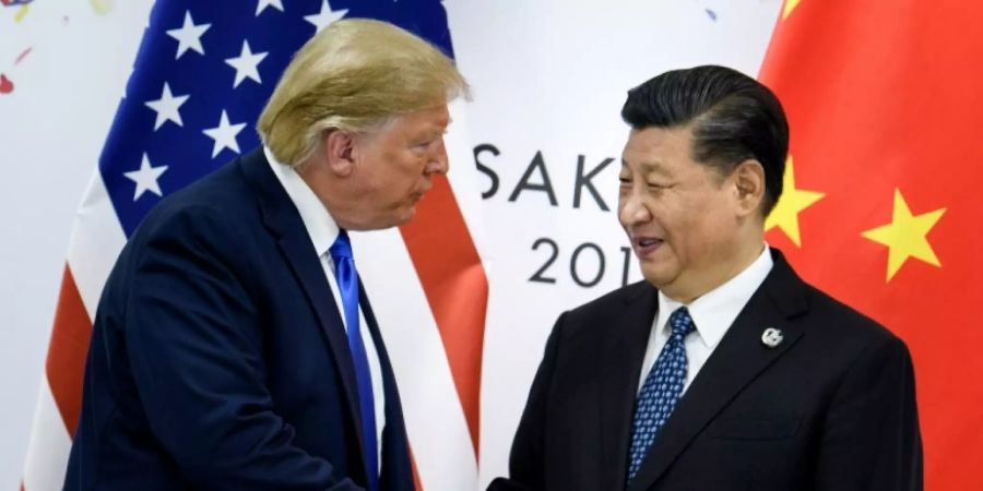 Präsidenten Trump (l.) und Xi Jinping