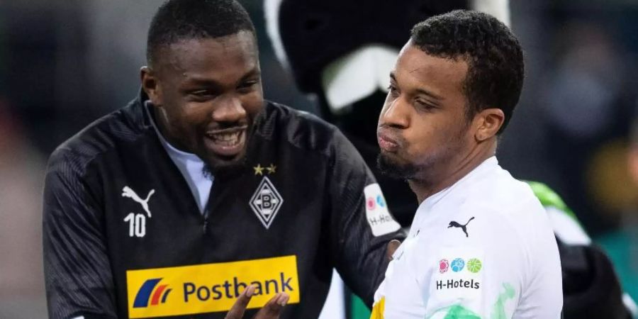 Gladbachs Traum-Duo: Marcus Thuram (l) und Alassane Plea. Foto: Marius Becker/dpa