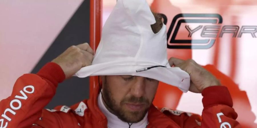 Hat derzeit nicht die beste Laune: Ferrari-Star Sebastian Vettel. Foto: Claude Paris/AP
