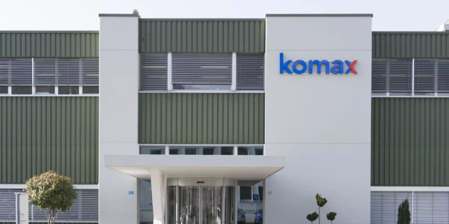 komax holding