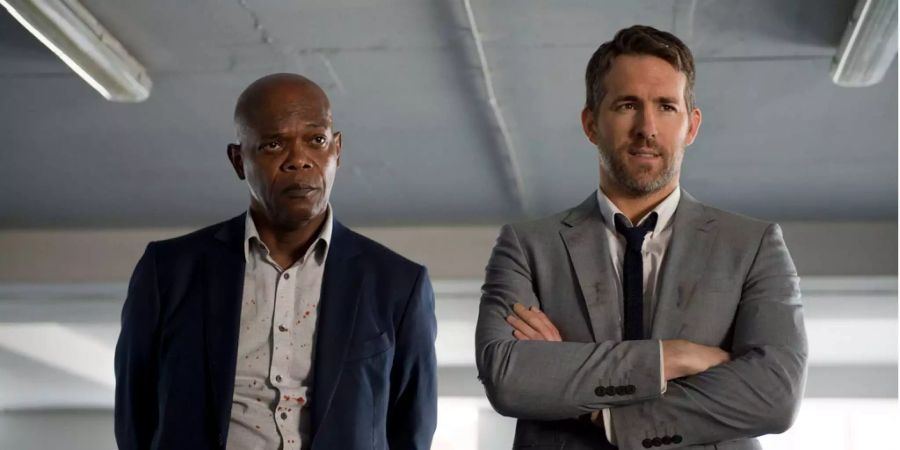 Samuel L. Jackson (l) und Ryan Reynolds in «Killer’s Bodyguard».