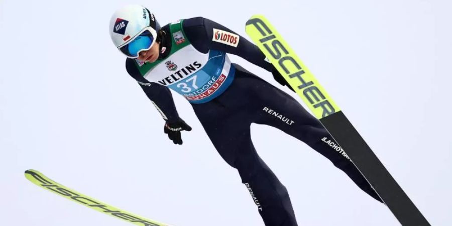 Olympia-Teilnahme fraglich: Skispringer Kamil Stoch. Foto: Daniel Karmann/dpa