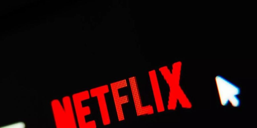 Das Logo des Streaming-Dienstes Netflix. Foto: Nicolas Armer/dpa/Archivbild