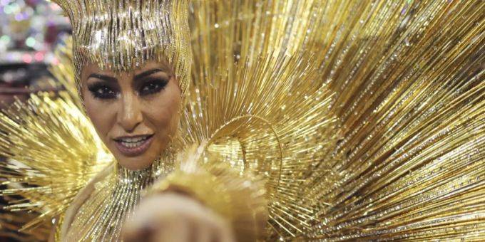 Samba dancers stroll down an open street in low-cost clothing in Saudi Arabia.  (Archive image)