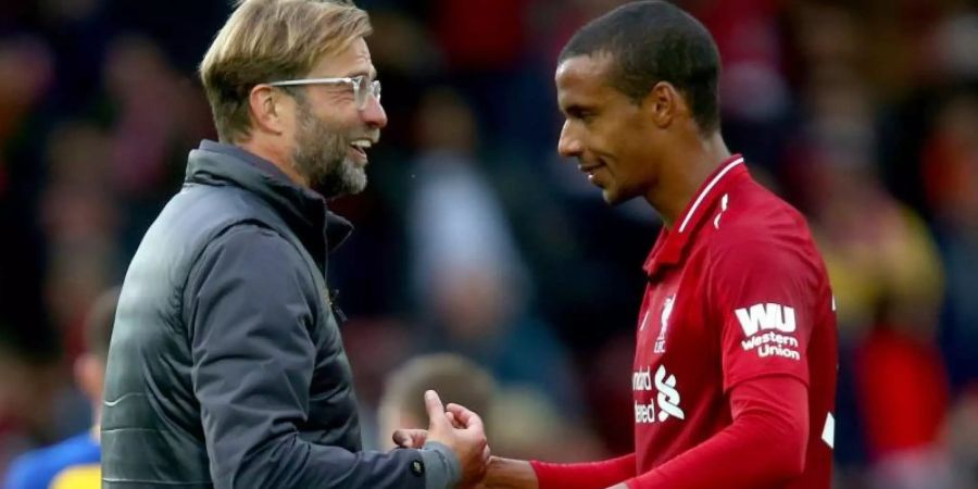 Hält Liverpools Tainer Jürgen Klopp (l) für etwas ganz besonderes: Joel Matip (r). Foto: Dave Thompson/PA Wire/dpa