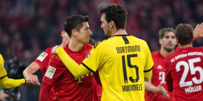 Treffen am Dienstag im Topspiel aufeinander: Bayern-Torjäger Robert Lewandowski (l) und BVB-Verteidiger Mats Hummels. Foto: Matthias Balk/dpa Treffen am Dienstag im Topspiel aufeinander: Bayern-Torjäger Robert Lewandowski (l) und BVB-Verteidiger Mats Hummels. Foto: Matthias Balk/dpa