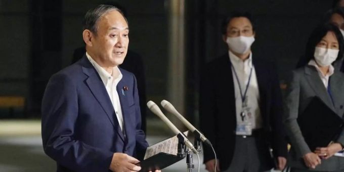 Japans Ministerpräsident Yoshihide Suga verkündet das Ende des Corona-Notstands in Japan. Foto: -/kyodo/dpa Japans Ministerpräsident Yoshihide Suga verkündet das Ende des Corona-Notstands in Japan. Foto: -/kyodo/dpa
