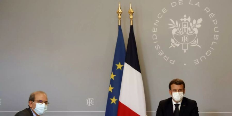 Macron (r.) mit dem CFCM-Präsident Moussaoui