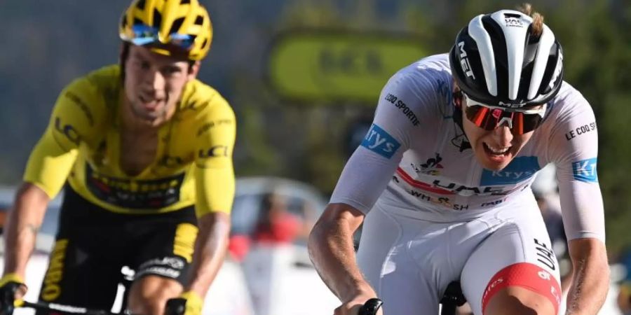 Dominieren die Gesamtwertung der 107. Tour de France: Tadej Pogacar (r) und Primoz Roglic. Foto: David Stockman/BELGA/dpa